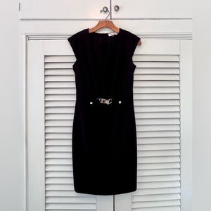 Calvin Klein sheath dress with gold accents and shallow V-neck front.
